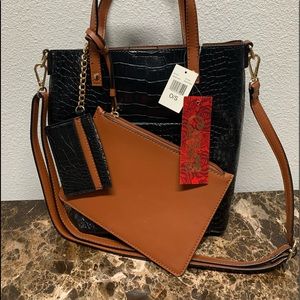 Carlos Santana Black crocodile bag